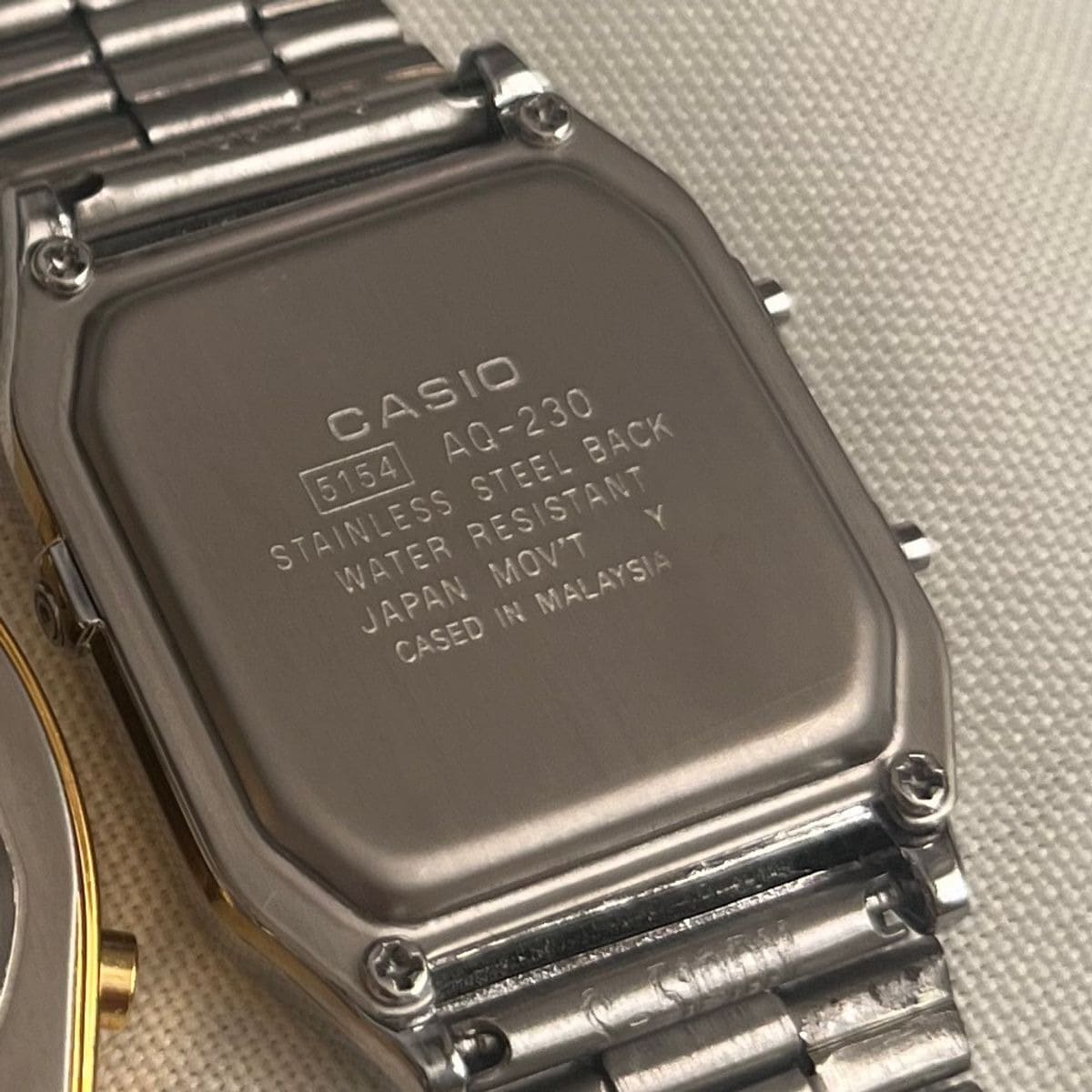 Relógio Casio Vintage Retangular Analógico e Digital AQ-230A Prata